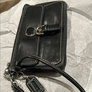 Coach Black Clutch with Leather Material and Wrist Strap